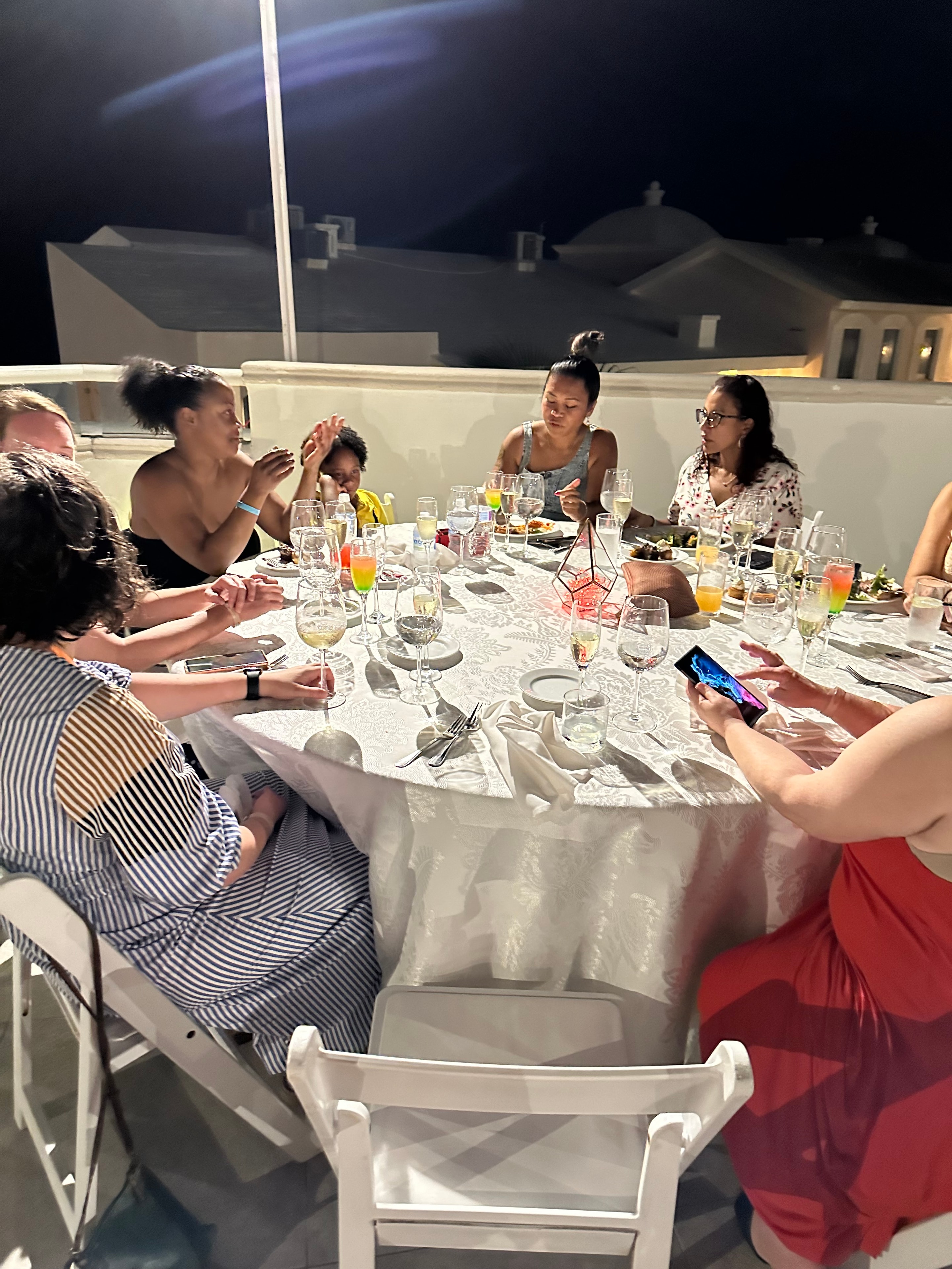 Attendees enjoying a dinner together at a Lactivents event