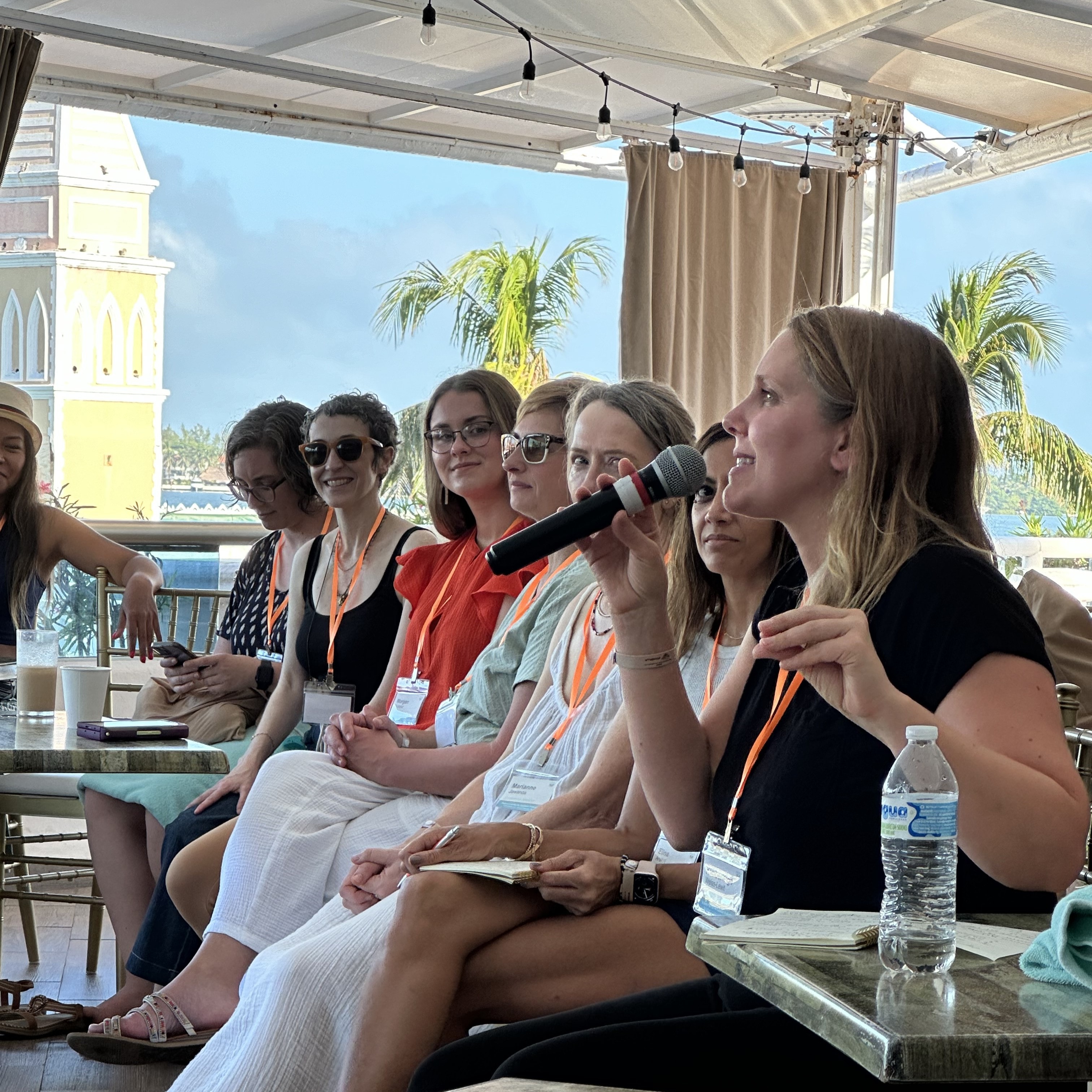 Attendees participating in an outdoor session